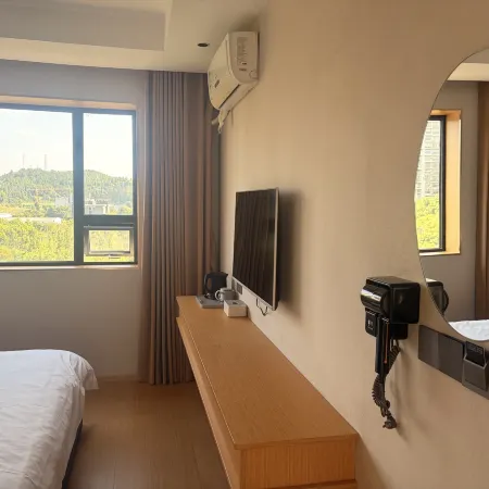 Zhouming Yuxiang Express Hotel (Suining Railway Station)