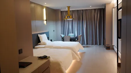 Wuchuan Yunman Hotel Отели в г. Вучуань