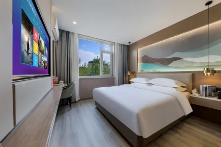 Wuzhong Miduo Hotel (Wanda Plaza) Отели рядом с достопримечательностью «Siliangqizi Qubbah»