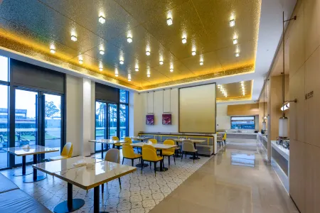 Liangzhi Huipin Hotel Отели рядом с достопримечательностью «Guanlanhu Huayi Fengxiaogang Dianying Gongshe-Nanyang Street»