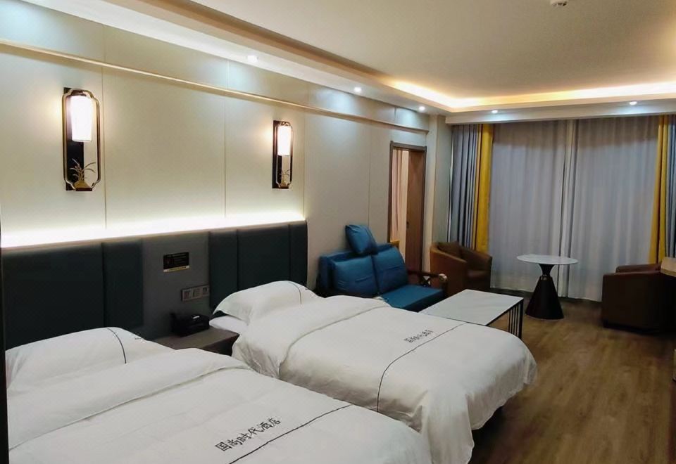 주즈 구오상 시대 호텔의 깔끔하게 정리된 객실 내부