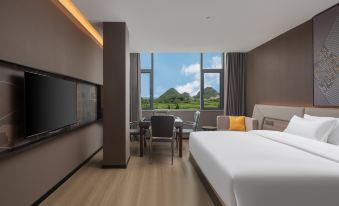 IU Hotel (Xingyi Yangguanggu Tourist Resort Hotel)