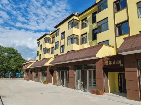 Yuehe Mountain Lodge Отели в г. Тьели