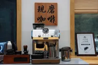 Wutaishan Jing She Mi Yuan. - خدمة نقل من وإلى المطار