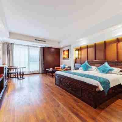 勐臘泓遠時代酒店（磨憨口岸店） Rooms