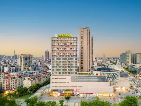 New Beacon International Hotel Отели в г. Цзянли