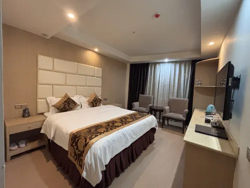 Yilong Xindu Hotel - parkir