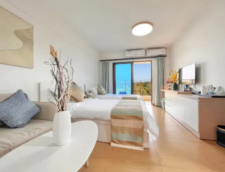 Fengyue Four Seasons Apartment Hotel (Yangjiang Hailing Island North Luowan Branch) Отели рядом с достопримечательностью «Dajiao Temple of the Queen of Heaven»