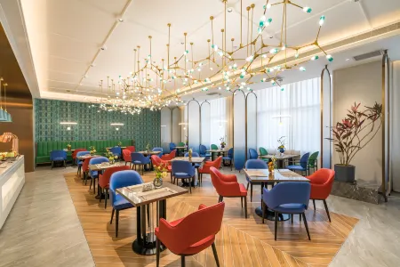 Madison Hotel Beijing Tongzhou Universal Beijing Отели рядом с достопримечательностью «Songzhuang Huajia Cun Gallery»