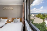 Xinchang Yaqin Homestay - Balkoner