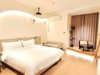 Qiyue Homestay (Anyang CBD Park Wanda)