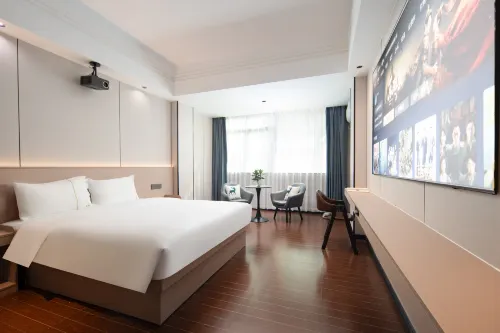 Guanda Business Hotel (Chengmai Branch)