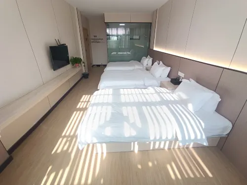 Dongzhi Xiangxu Yijia Hotel - Parkplatz