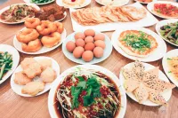 Good Hotel Zhaosu Hometown - servizio colazione