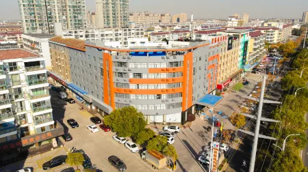 Kangliya Be Home Hotel Отели рядом с достопримечательностью «Huguo Temple»