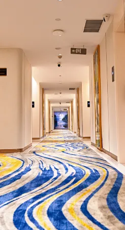 Gubo    International    Hotel Отели рядом с достопримечательностью «Hanzhong Gymnasium»