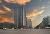 Munan Manju Movie Hotel (Dongyi Road Subway Station) Hotel dekat Xi'an Shiyou University (South Area)