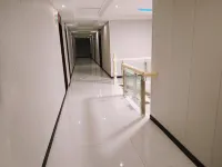 Qijiang Huadu Business Hotel Hotel di Yuanjiang