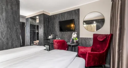 PLAZA INN Mühldorf Отели в г. Тёгинг-на-Инне