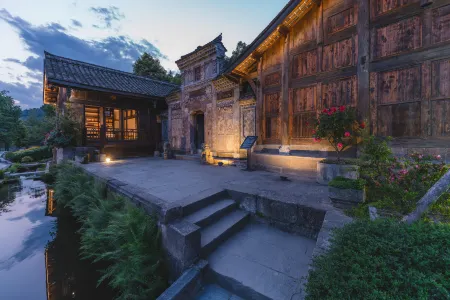 Qujia Courtyard Guesthouse Отели в г. Нинцян