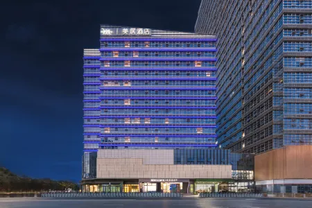 Mercure Wuxi East Railway Station Отели в г. Уси