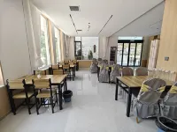 Mòsháng Riverhouse Blossoms Hotel - sarapan
