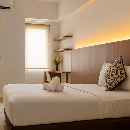 Quintessa Room at Candiland Apartement