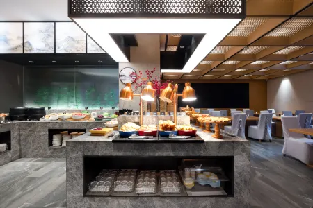 Nanjing Olympic Sports Expo Center UEASY Hotel Отели рядом с достопримечательностью «Huangfeng Building»