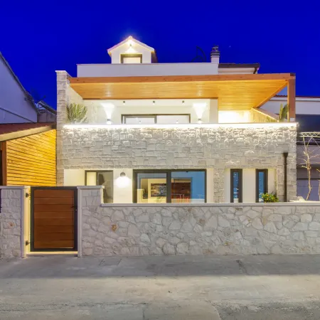 Seafront villa Kupinica with private indoor Pool
