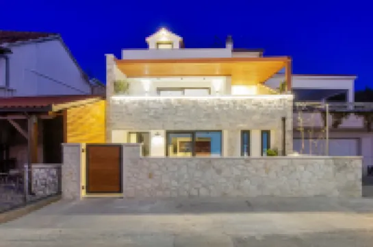 Seafront villa Kupinica with private indoor Pool Hotels in 