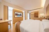 Yijin Hotel (Xingyi Jushan Square Mengle City Branch)