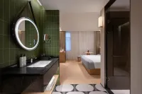 Wanda Moments Guesthouse, Qingdao Zhanqiao - bar