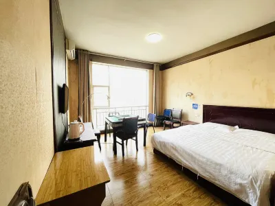 Juxian Business Hotel (Tongren High-speed Railway Station) Hotel a 