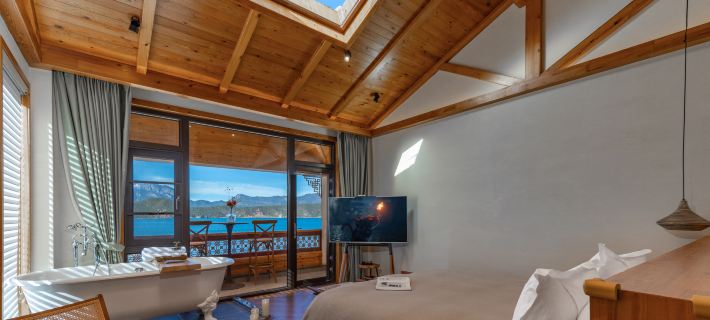 Lugu Lake Qingchen. Qianxun Lake View Hotel Ξενοδοχεία στην πόλη Νίνγκλανγκ