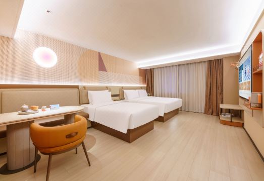 Orange 호텔 (다롄 하버 플라자 지점) 침실 사진