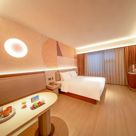Orange Hotel (Longnan Station Government Service Center) Отели в г. Луннань