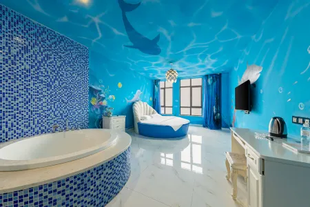 Jiuduo·Yunji Hotel (Xinyang Railway Station Tianrun Plaza) Отели рядом с достопримечательностью «Xinyang Normal University»