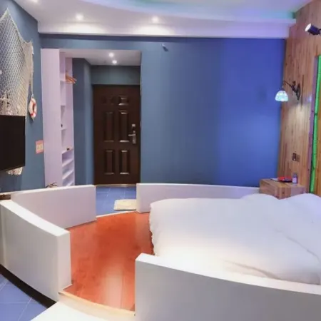 Manyi Homestay (Xinxiang Baolong Plaza)