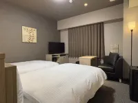 HOTEL ROUTE-INN OKAYAMA MANIWA فنادق في 