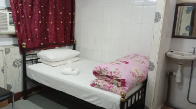 Everest Base Camp Hostel (Main reception Block B 10F B1/B2) Hotel in zona Helena May
