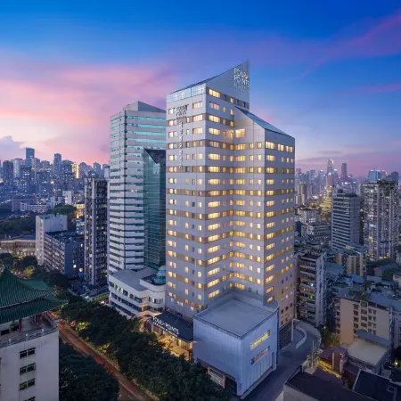 Four Points by Sheraton Chongqing Yuzhong Peninsula Отели рядом с достопримечательностью «Стадион «Датяньвань»»