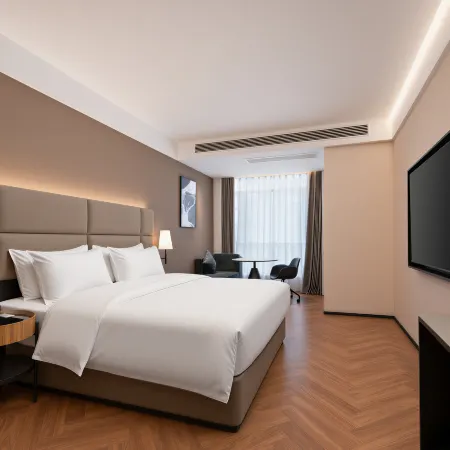 Meiduo Hotel (Shanghai Road, Hanjiang Normal University Branch)