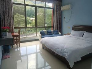 Zhou Loman Yougu Homestay