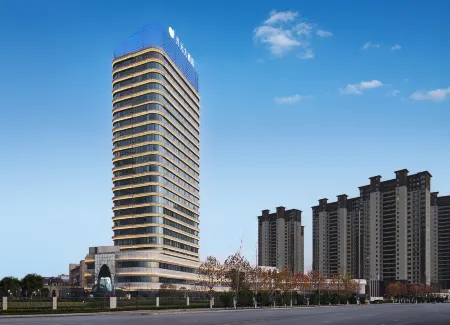 New Century Hotel Yugan Отели рядом с достопримечательностью «Yugan Museum»