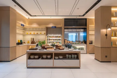 Echarm Hotel (Zhanjiang Suixi Quanfengguangchang) Отели в г. Суйси