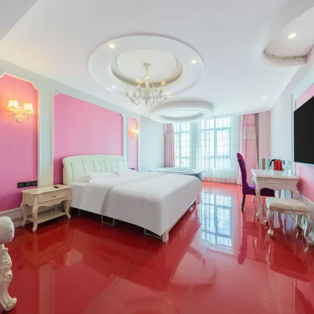 Manyu theme hotel (Xinyang railway station Tianrun Plaza shop)