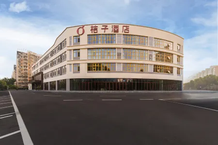Orange Hotel (Tengzhou Government wuyueplaza ) Отели рядом с достопримечательностью «Tengzhoushi Shimin Park»