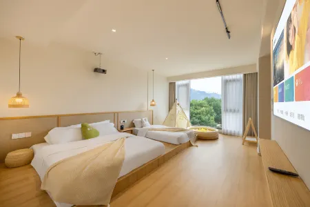 Qixi Guesthouse (Xianju Yong'an River Rafting Branch) Отели рядом с достопримечательностью «Yong'an Park (Chenxi Road)»