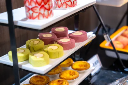 Ginza Mani Hotel (Jinan Olympic Center MixC Store) Отели рядом с достопримечательностью «Shandong Open University»