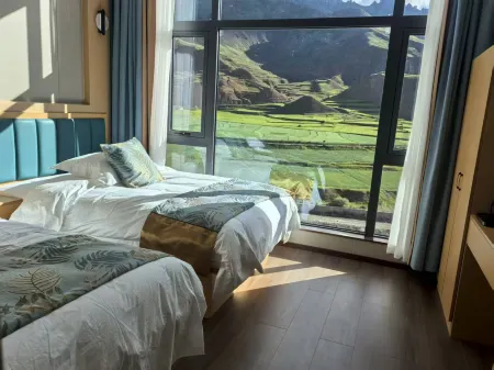 Dengqen Jueen Ta Luocang Grand Hotel Отели в г. Динцин